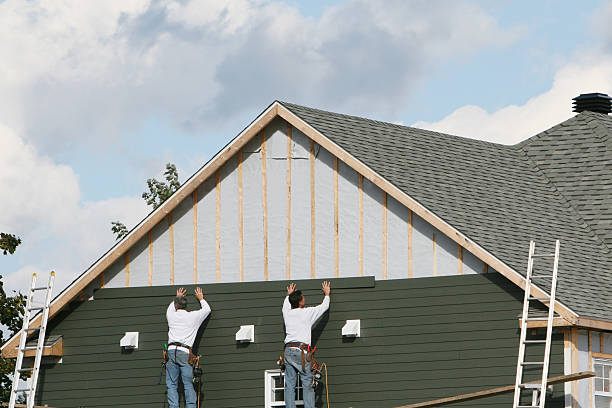 Professional Siding technician working in White Marsh, MD